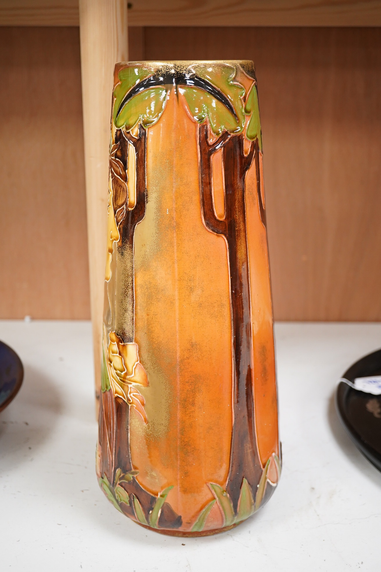 A Continental Art Nouveau tube lined ‘maiden’ vase, 36cm high. Condition - fair